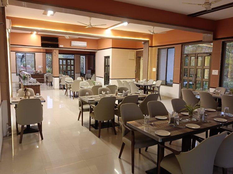Flavour Restaurant interior — Choice Resort Bhopal Garden restaurant seating at Choice Resort Bhopal — ideal for family dining
