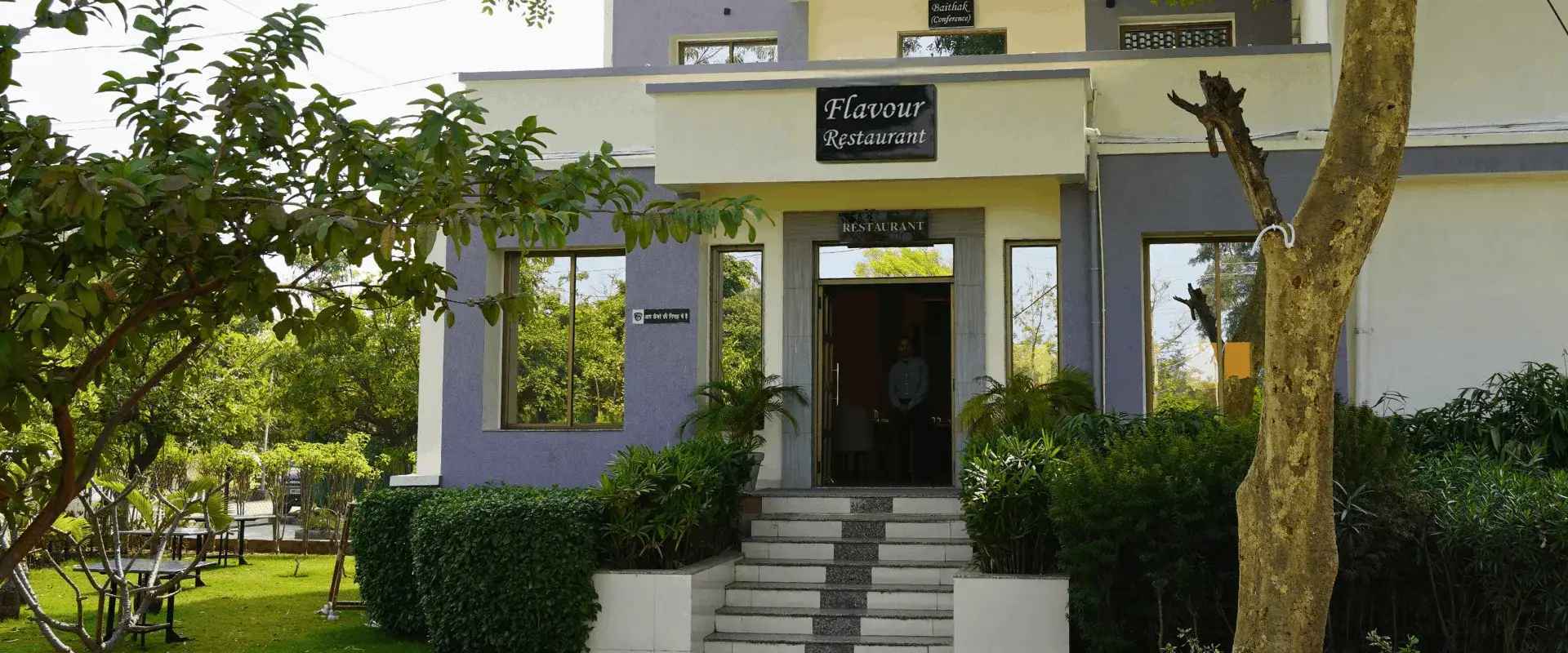 Flavour Restaurant — Choice Resort Bhopal Nature-themed outdoor dining at Flavour Restaurant, Choice Resort Bhopal